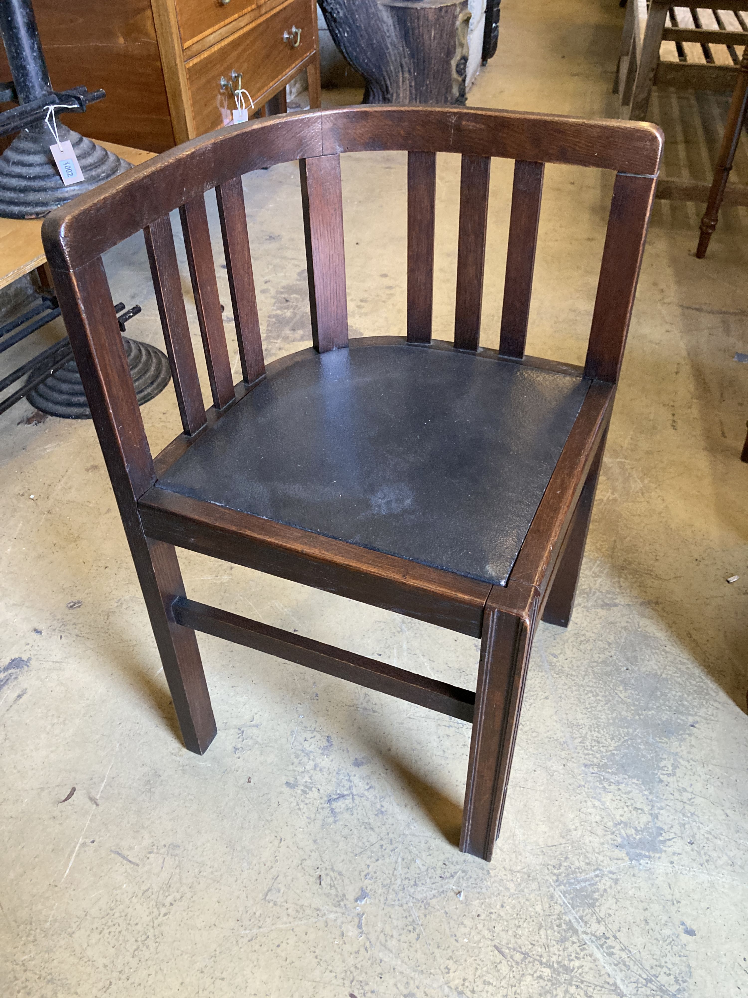 A Heals style oak table, length 92cm, depth 92cm, height 74cm and four chairs